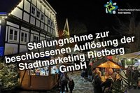 Adventsmarkt im Hintergrund, darüber der Schriftzug "Stellungnahme zur beschlossenen Auflösung der Stadtmarketing Rietberg GmbH"